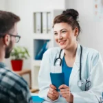 Woman Doctor prescribes medicine to young patient to treating his disease